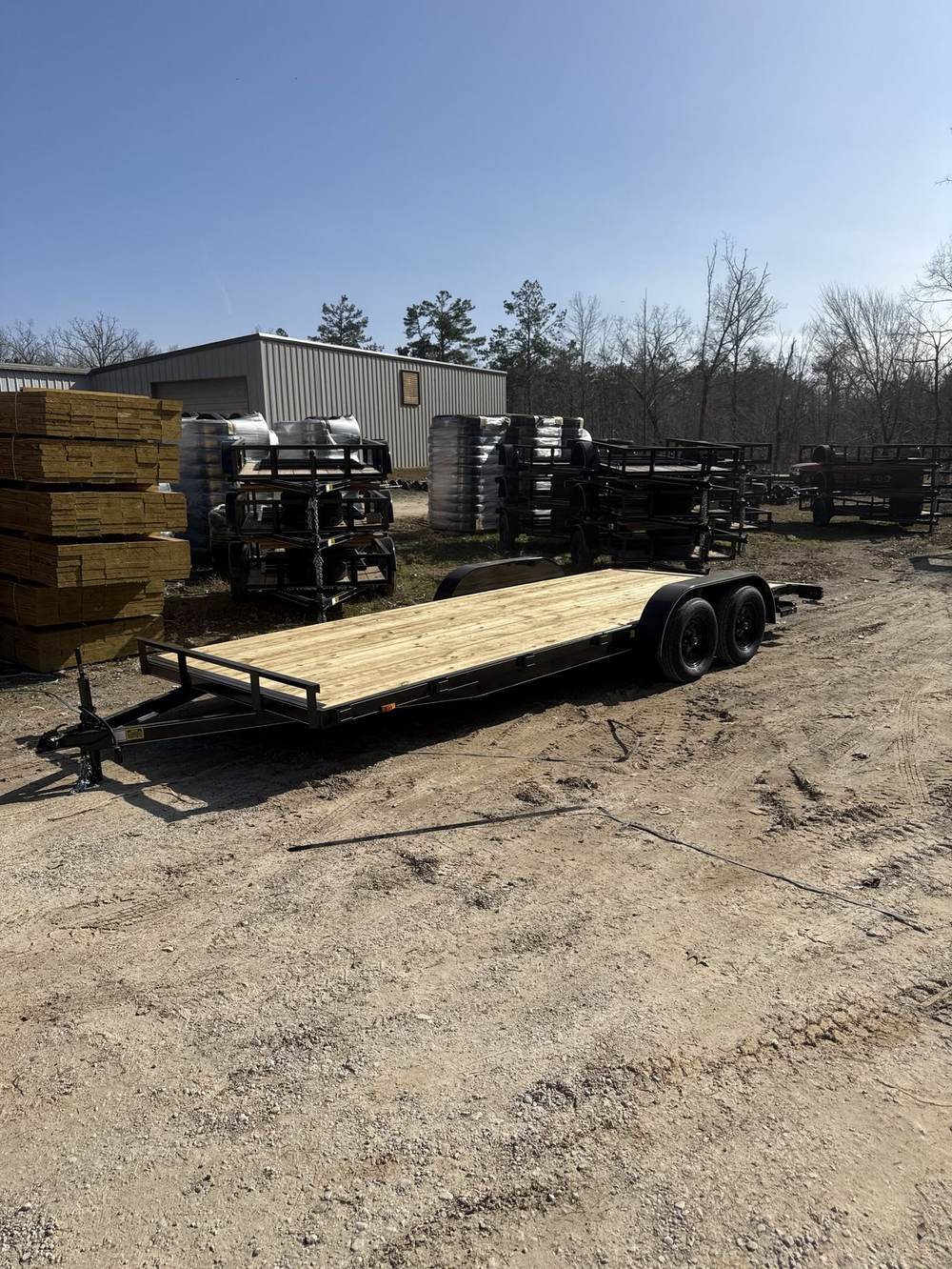 Wood deck and ramps on a Triple R equipment hauler