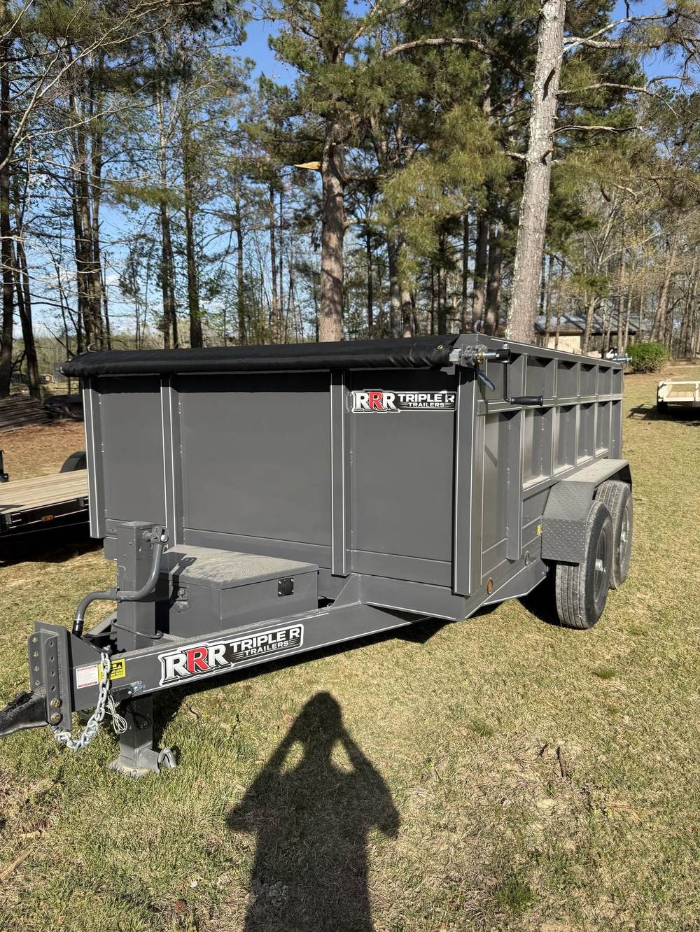 Gray Triple R dump trailer with the RRR decal on the side