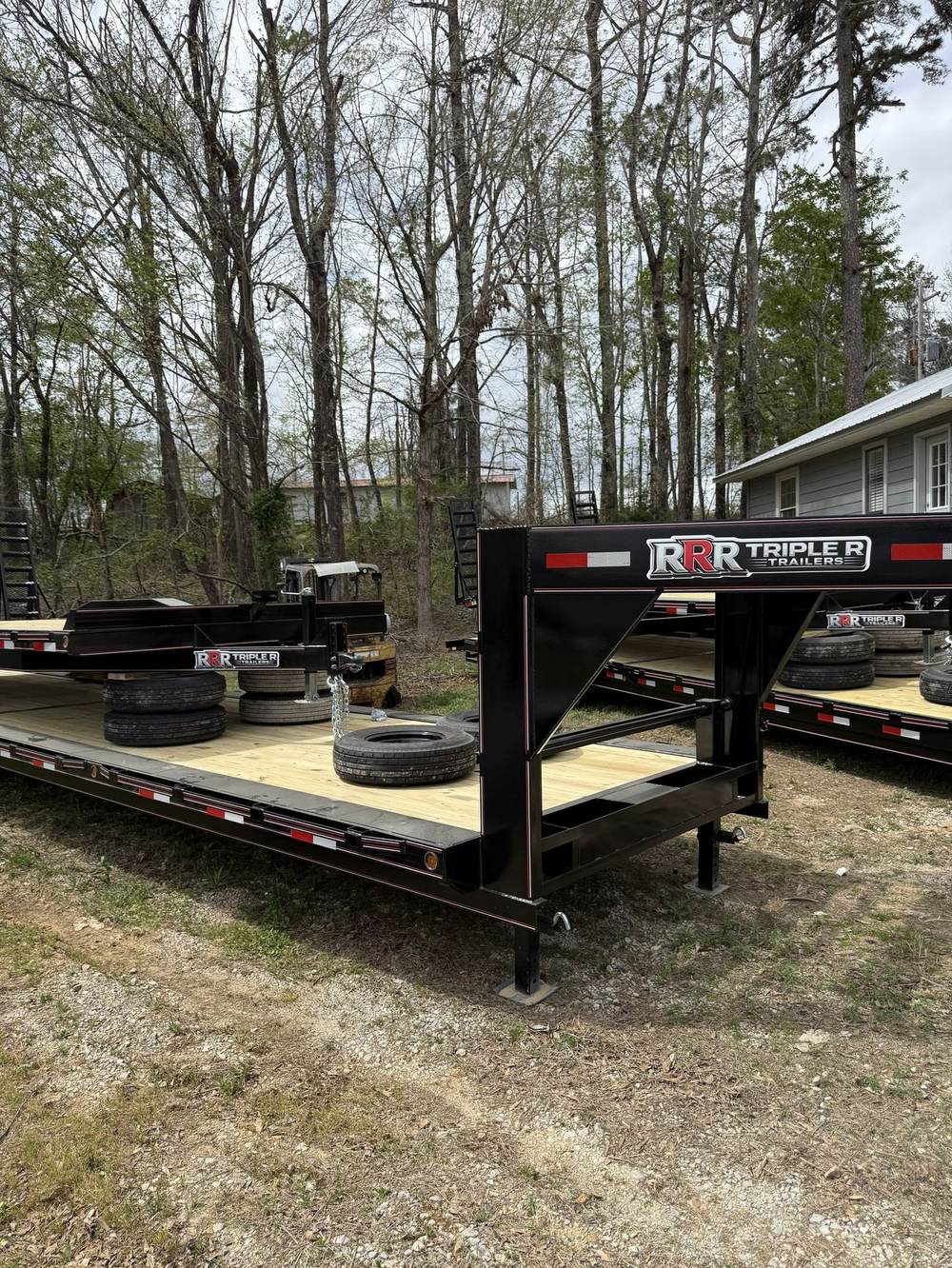 Long wood deck on a Triple R gooseneck trailer