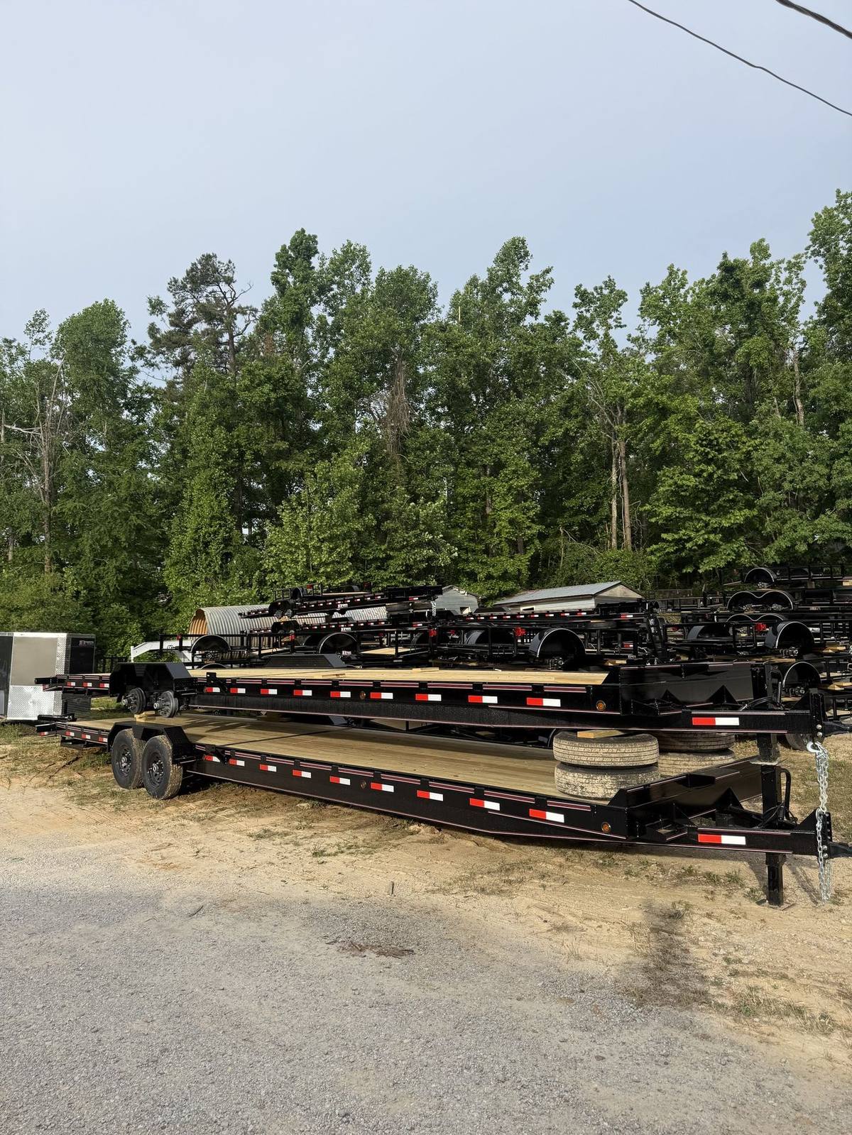 Rows of finished Triple R trailers staged in the Booneville yard