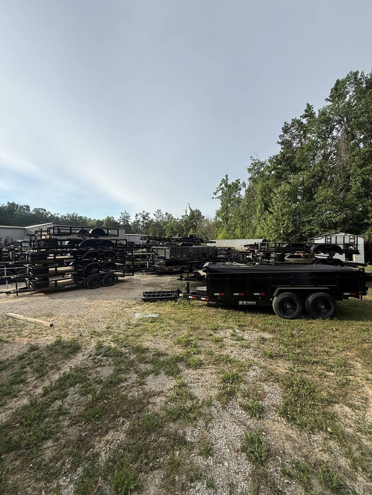 Rows of finished Triple R trailers across the factory yard in Booneville, Mississippi